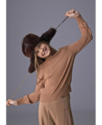 Maglione apertura spalle ragazza